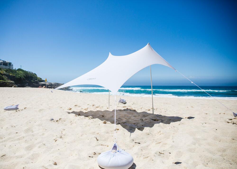 wave break beach tent Australia