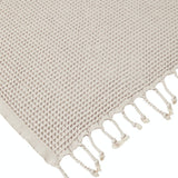 Ozoola Waffle beach towel in grey with tassles