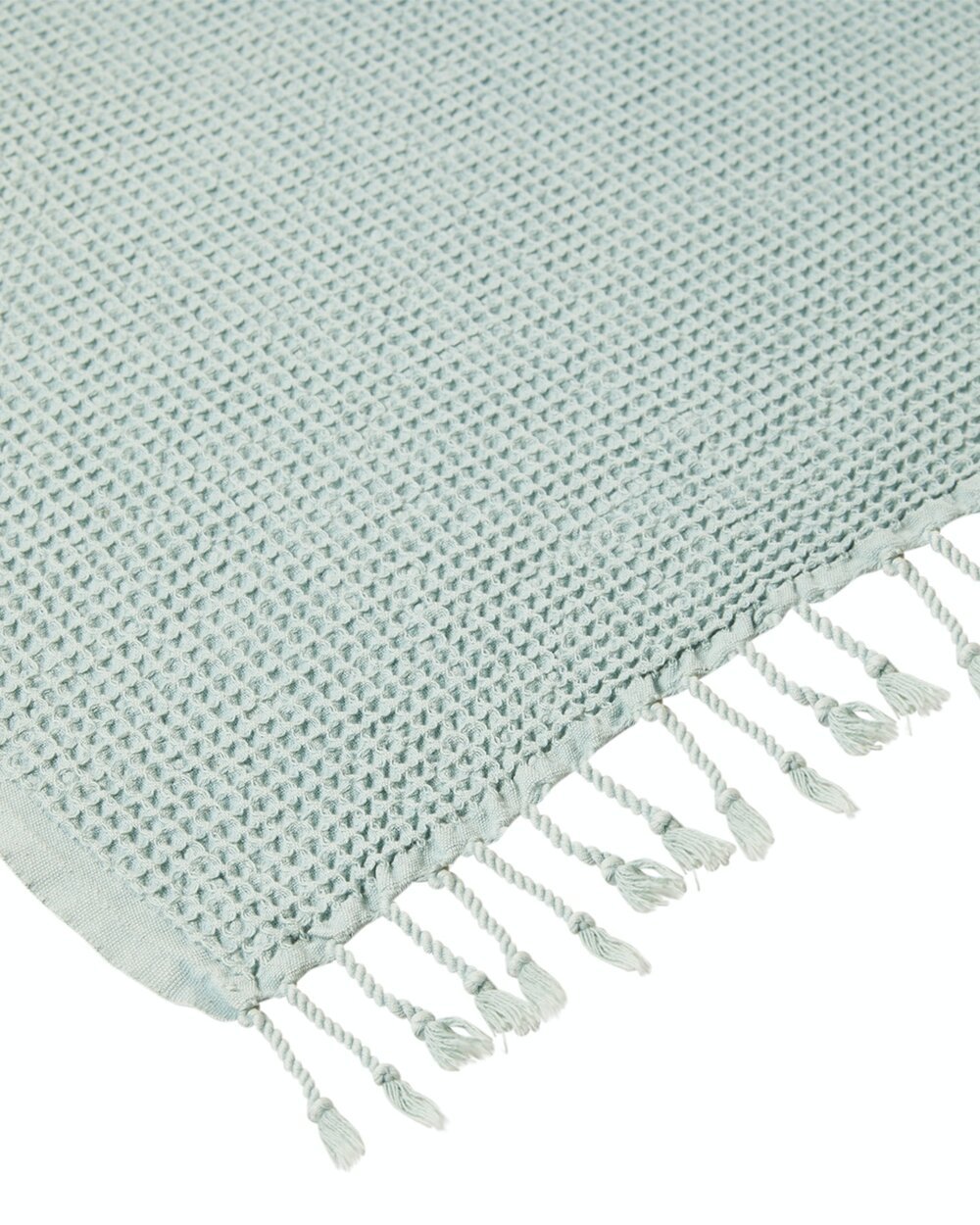 Ozoola Waffle beach towel in mint with tassles