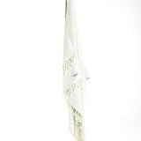 Ozoola Turkish beach towel in baby blue hanging