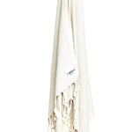 Ozoola Turkish beach towel in grey hanging