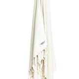 Ozoola Turkish beach towel in grey hanging