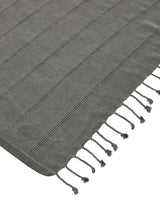 Ozoola Turkish beach towel in charcoal stonewash tassles