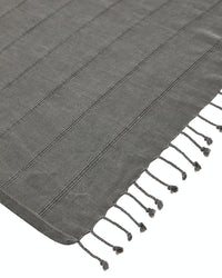 Ozoola Turkish beach towel in charcoal stonewash tassles